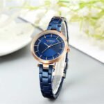 CURREN 9054 ladies quartz bracelet watch stainless steel blue front view